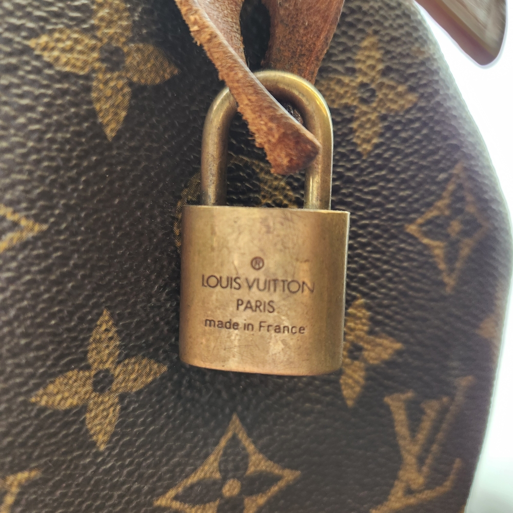 Louis Vuitton Monogram Canvas with Tan Leather Accent - Picture 11 of 11